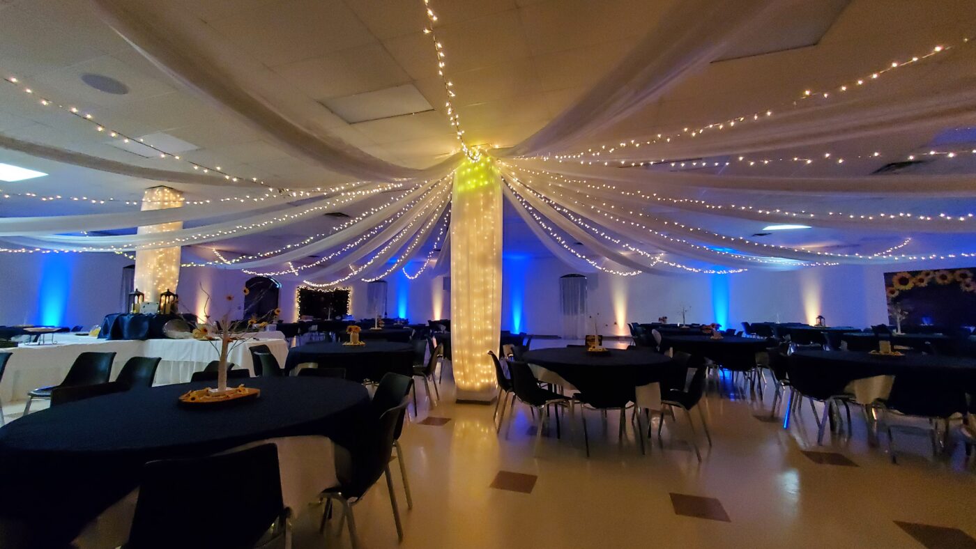 Blue and yellow uplighting at dallas texas wedding reception